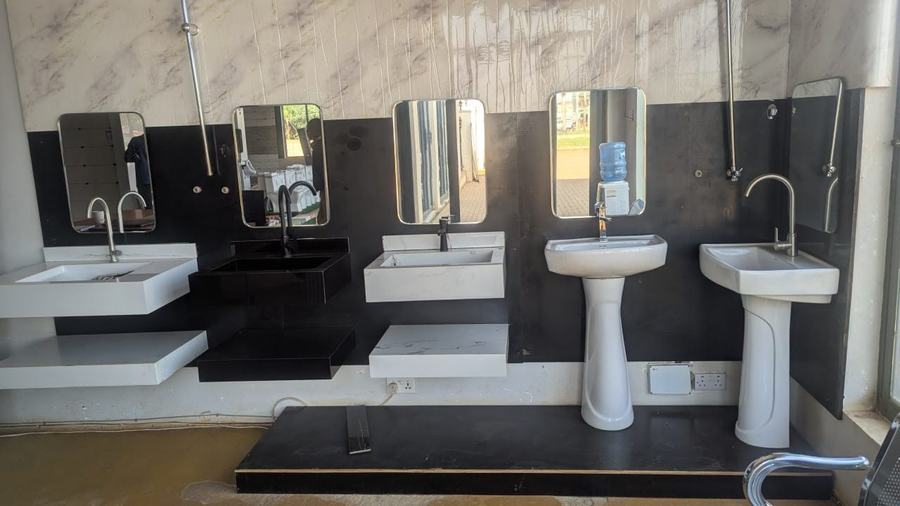 Bathroom vanity and sanitary ware display at Aura Investments Uganda