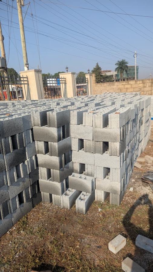 Concrete block yard and masonry materials supplied by Aura Investments Kampala