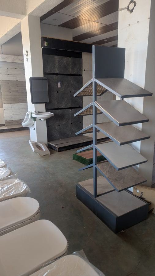 Glass and aluminium showroom display at Aura Investments Uganda